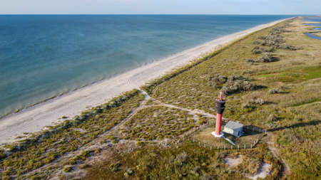 lighthouse on the seashore long sandy coastline, Ukraine, Odessa regionの写真素材