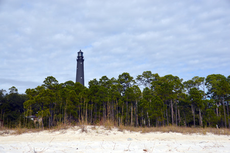 A photo of a Florida lighthouse from the beachの写真素材