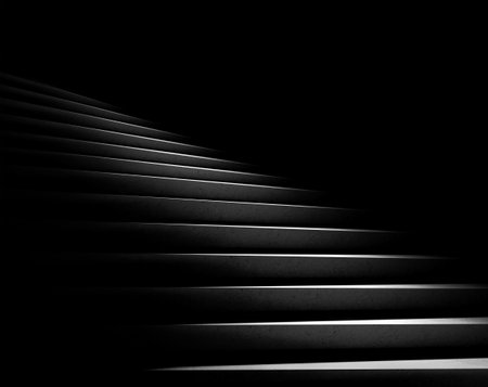 Black background. Stone stairs with abstract light. Steps in the darkness. 3D renderingの写真素材