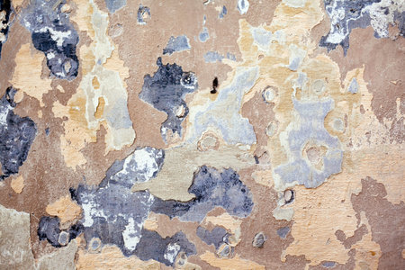 Old wall with peeling paint. Abstract background and texture for design.