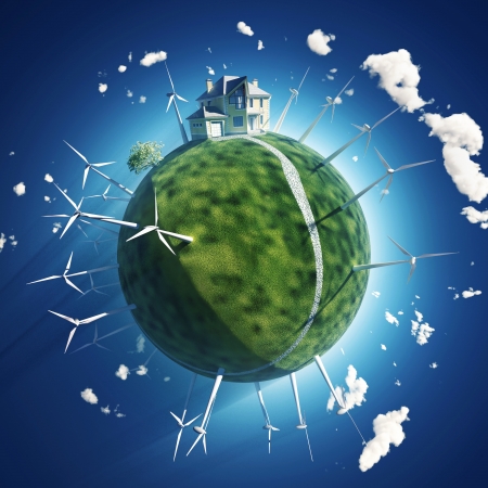 house and wind turbine on green planetの写真素材