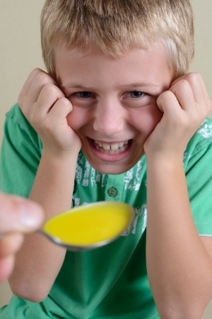 Boy Taking Medicineの写真素材