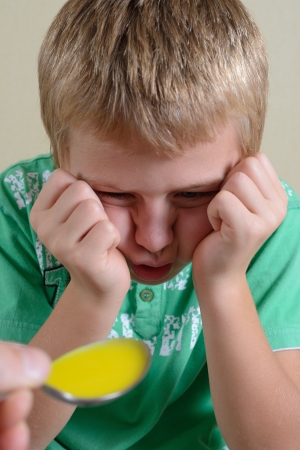 Child Refuses to Take Medicineの写真素材