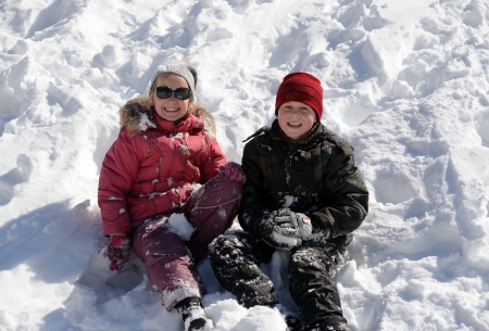 children playing in snowの写真素材