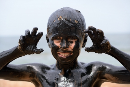 child in the mudの写真素材