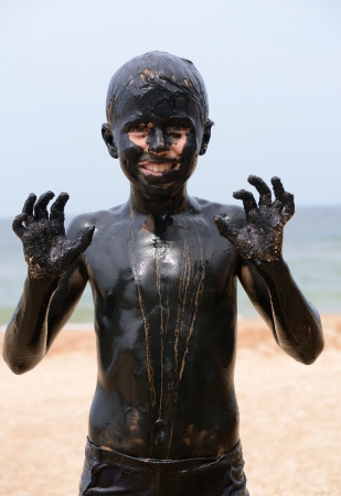 child in the mudの写真素材