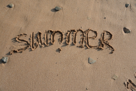 word summer on a sand beachの写真素材