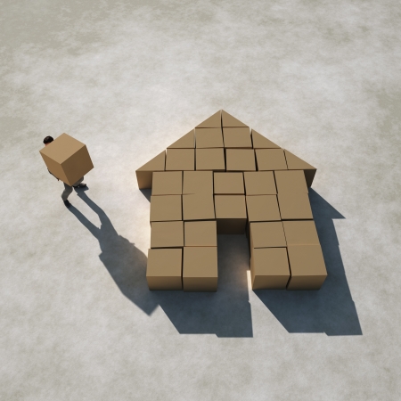  businessman builds a houseの写真素材