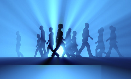 crowd of people walking in the fogの写真素材