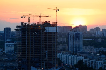 cranes building skyscraperの写真素材