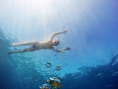 man swim in the seaの写真素材