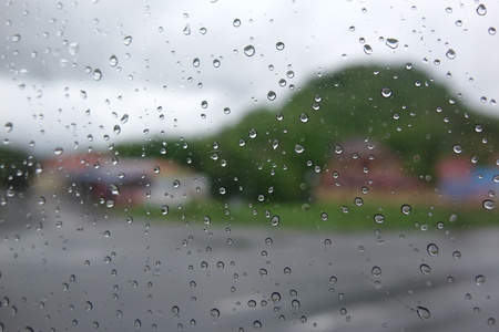 rain drops  on the car glassの写真素材