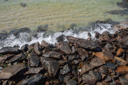 Beautiful landscape with ocean, waves, rocks and skyの写真素材