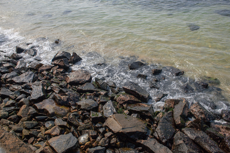 Beautiful landscape with ocean, waves, rocks and skyの写真素材