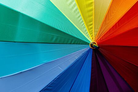 Umbrella with rainbow colors.の写真素材