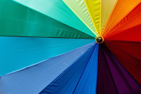 Umbrella with rainbow colors.の写真素材