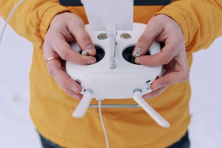 Young male tourist Using drone photographs and shoots natureの写真素材
