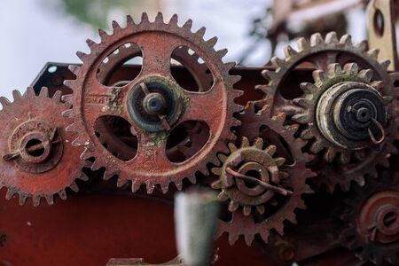 Old rusty farm equipment agricultural combine mechanismの写真素材