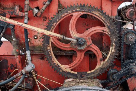 Red old rusty farm equipment の写真素材