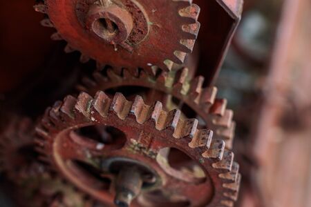 Old rusty farm equipment agricultural combine mechanismの写真素材