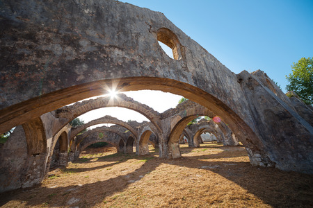The arches of the the Corfu Venetian arsenal. The Venetian arsenal at Gouvia is a shipyard built by...