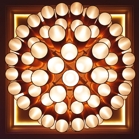 Abstract round chandelier made of stacked wide pipesの写真素材