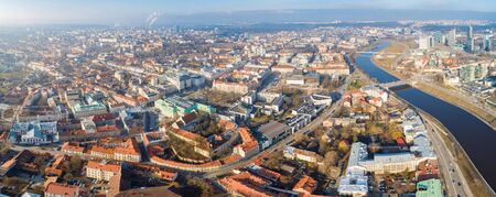 Aerial panoramic view of Vilnius old town, business district and river Neris, Lithuaniaの写真素材