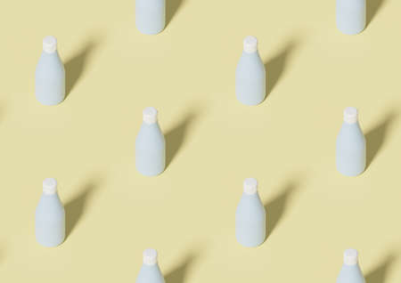 Seamless pattern of a blue bottle on yellow backgroundの写真素材