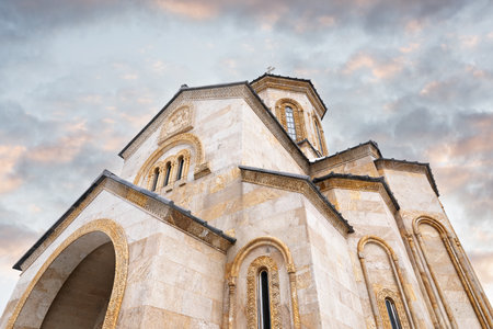 Detailed view of a Tsminda Sameba Monastery, Batumi, Georgia with arched windows, ornate carvings,...