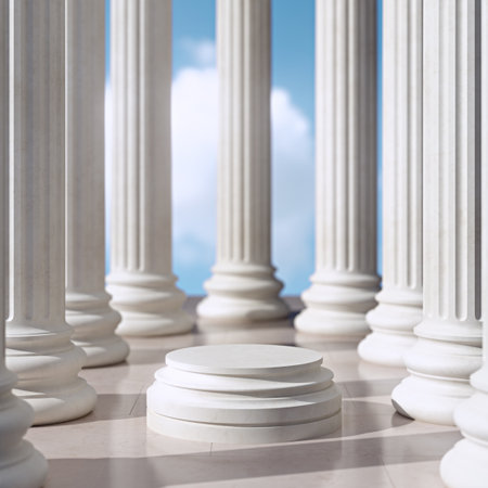 Empty round product stand surrounded by fluted pillars under a blue sky, perfect for showcasing items.の写真素材