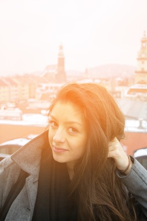 beautiful arabic girl smile to camera in Germany with city background