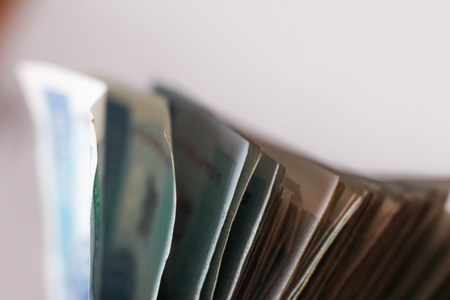 Macro money 100 euro background. golden bitcoin coin on us dollars. Cryptocurrency business concept greenの写真素材