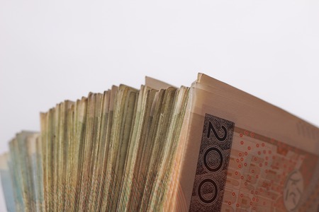 Macro money 100 euro background. golden bitcoin coin on us dollars. Cryptocurrency business concept greenの写真素材