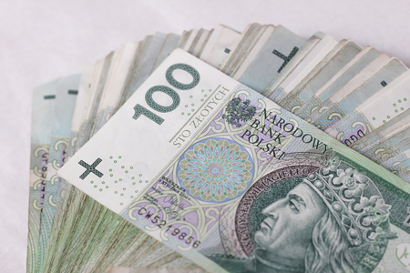 Macro money 100 euro background. golden bitcoin coin on us dollars. Cryptocurrency business concept...