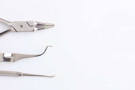 Dentist tools. Teethcare, dental health concept. White background top view copy spaceの写真素材