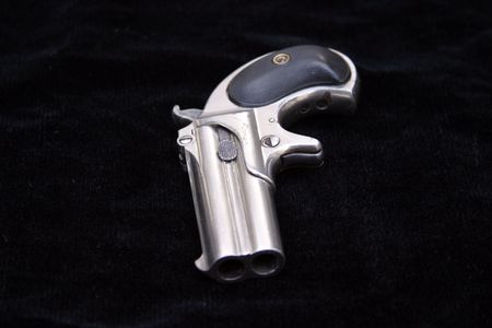 Circa 1889, Model 95, Type II Model 3 Double Derringer on black velvetの写真素材