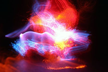  painting with light using the bulb or  time laps technique in a pitch black room with mulit color...