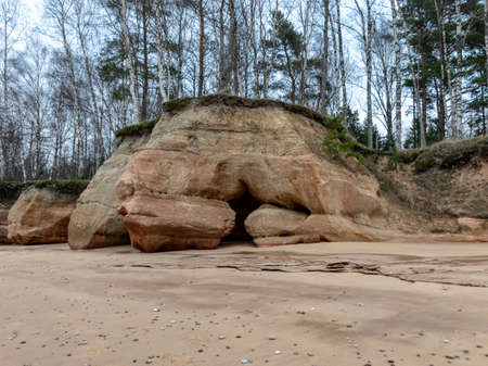 landscape with sandstone cliffs, stony seaside of Vidzeme, Latviaの写真素材