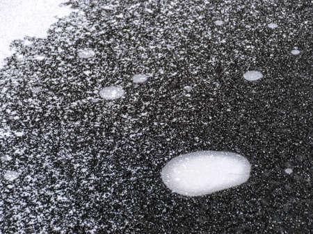 abstract black and white texture of snow and iceの写真素材