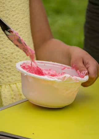 bowl with a colorful slime, making a slime at a birthday party, children's games - making a slime, handmadeの写真素材