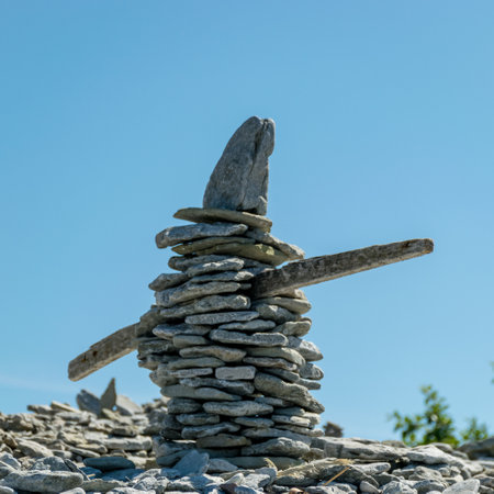 picture with beautiful white stone piles by the sea, these objects were built by travelers, Saaremaa Island, Estoniaの写真素材
