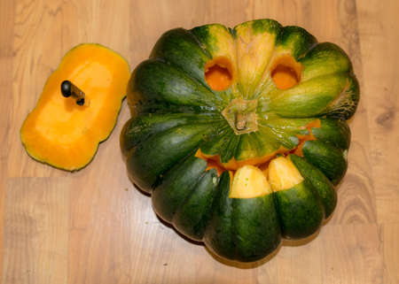 Preparing for Halloween, pumpkin carving, green carved pumpkin for Halloween, Halloween Jack o Lanterns, autumnの写真素材