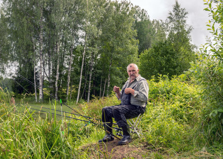 sunny summer landscape by the lake, fisherman on the lake shore, lake grass in the foreground,...