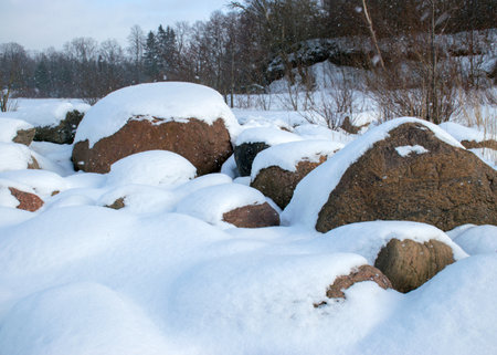 landscape with a rocky sea shore in winter, winter day by the sea, winterの写真素材