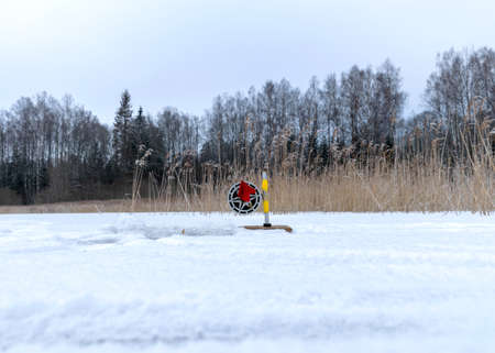 winter landscape from a frozen lake, ice fishing
accessories