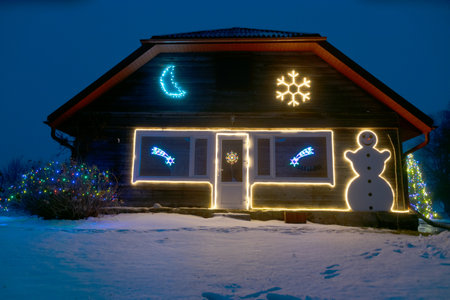 Night landscape with a decorated yard with a Christmas motif, light decorの写真素材
