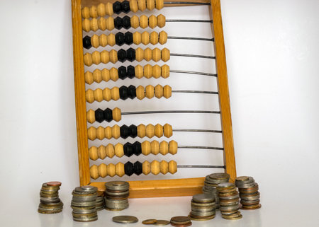 photography with various shapes, countries and values of old metal coins, against the background of...