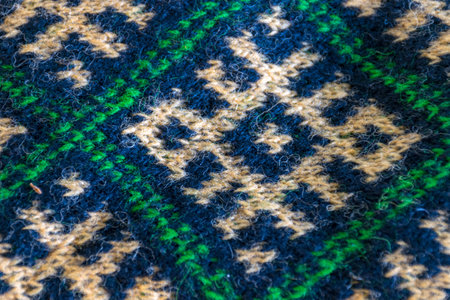 handicraft concept, close-up of knit writing, knitting as a hobby, handicrafts are a good way to spend free timeの写真素材