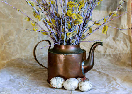 ancient copper mug with poplars, celebration of Easter, feast of the Christian world in spring