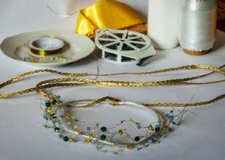 various tools and accessories for making a pearl crown, handmade, spending free time at home,...